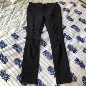 Levi’s black 711 ripped skinny jeans